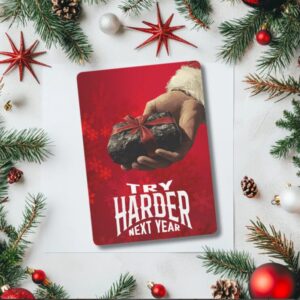 Funny Christmas card featuring Santa’s hand holding a lump of coal tied with a red ribbon, with the text “Try Harder Next Year.” Perfect sarcastic Christmas card for friends or coworkers with a sense of humor.